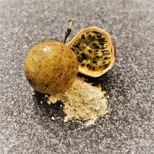 passion fruits next to yellow powder